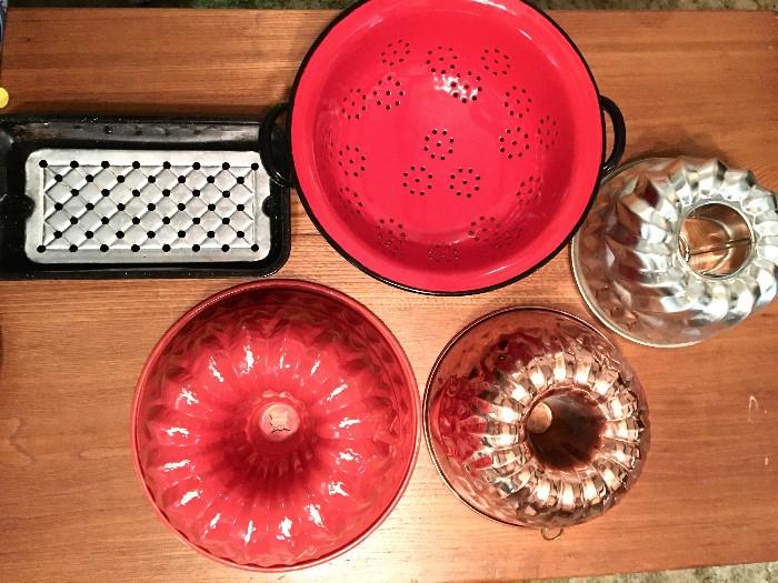 Many vintage enamelware and molds