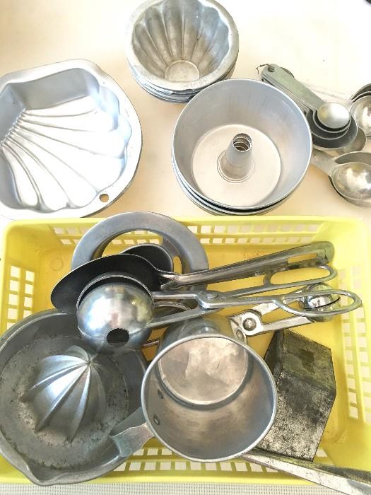 Darling vintage aluminum kitchenware abounds