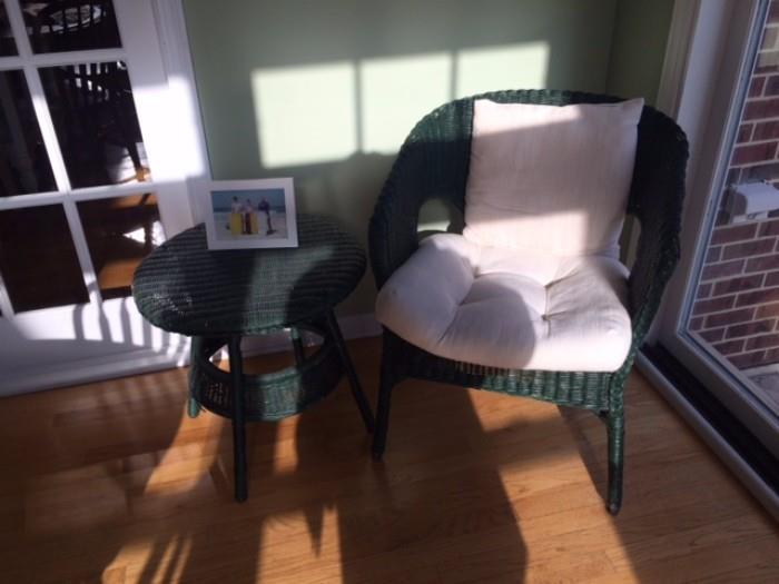 Green wicker chair and side table