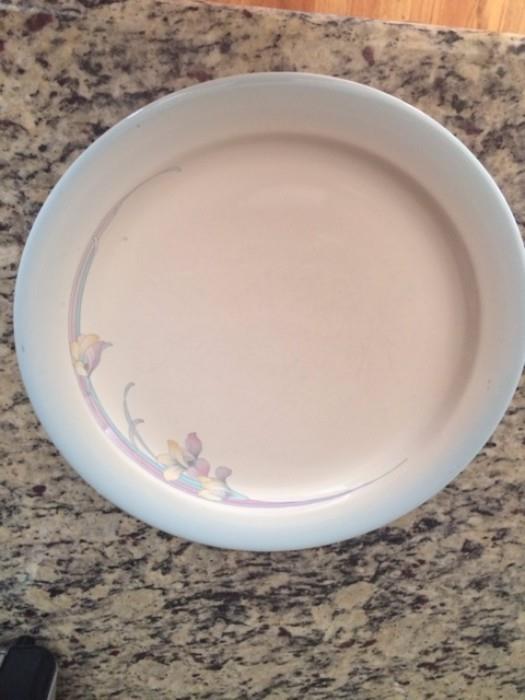 Set of china plates and bowls and serving dishes