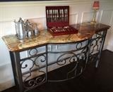 A unique piece of Onyx tops this metal console table, Arthur Court pewter coffee set, "Baroque" pattern Godinger flatware