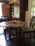A STICKLEY wood base supports a custom cut  "Australian Woods" granite top, ( 41"round x 29.5"H). Two Chippendale style chairs (set of 4), Armoire 