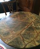 Detail of "Australian Woods" 41" round granite top Stickley table