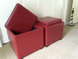 Pair of red leather storage cubes