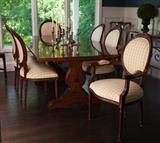 Henredon Dining Table 85"L x 44"W, has two additional leaves not shown. Set of 4 side chairs and 2 arm chairs, Made in Brasil, carved wood upholstered with a cheery yellow check fabric 