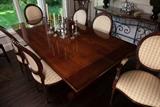 Henredon Dining Table 85"L x 44"W, has two additional leaves not shown