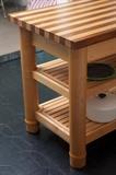 Gorgeous kitchen island with removable center shelf and built in knife holder. Constructed of Black Walnut and Birch. Unique, custom built, food safe finish on the top. Movable!