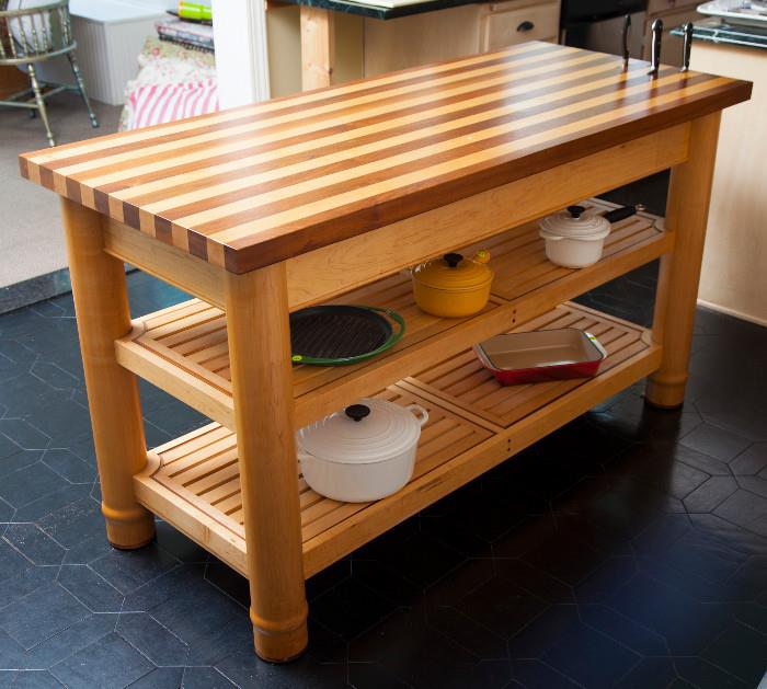 Gorgeous custom wood kitchen island with removable center shelf and built in knife holder. Constructed of Black Walnut and Birch