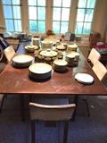 Gilbert Rohde dining table and six chairs in need of restoration