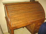 Oak single pedestal C-roll top desk