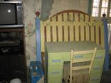 Painted student's desk, picket fence headboard, & wicker headboard