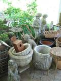 Lots of planters and garden statues