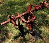 Farmall Garden Tractor – Runs Great! Includes 6 plow blades. 4 tine rake, chain driven fertilizer hopper with hose attachment, accessory bar for attachments, 6 extra attachment shanks, 2 discs hillers and middle buster, clamps, extra sweeps, extra hiller, 3 point hitch, belt drive attachment, tow bar