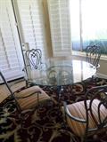 Iron dinette set with glass top table, 4 chairs