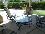 Round Glass Top Cocktail Table, 4 Swivel rocker chairs