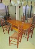 Rustic dinning set with 6 spindle back wicker seat chairs--hand made in 1902
