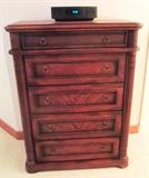 Leather strip embossed chest of drawers part of matching bedroom set w/entertainment center