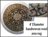 four foot diameter handwoven wool area rug