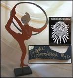 official cirque du soleil sculpture signed Judie Bomberger. Depicts circus lyra (hoops) performer from Alegria.