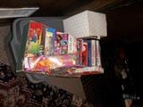 Some doll stuff Action Jackson and some of his packaged clothes