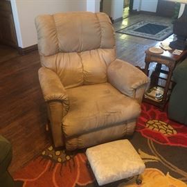 Suede Recliner and small vintage foot stool, floral rug