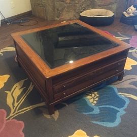 Square coffee table with storage