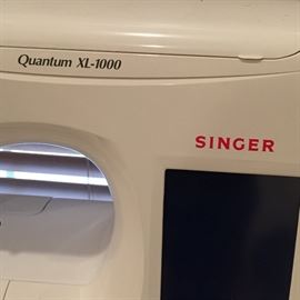 Quantum XL-1000 Singer sewing machine with sewing cabinet