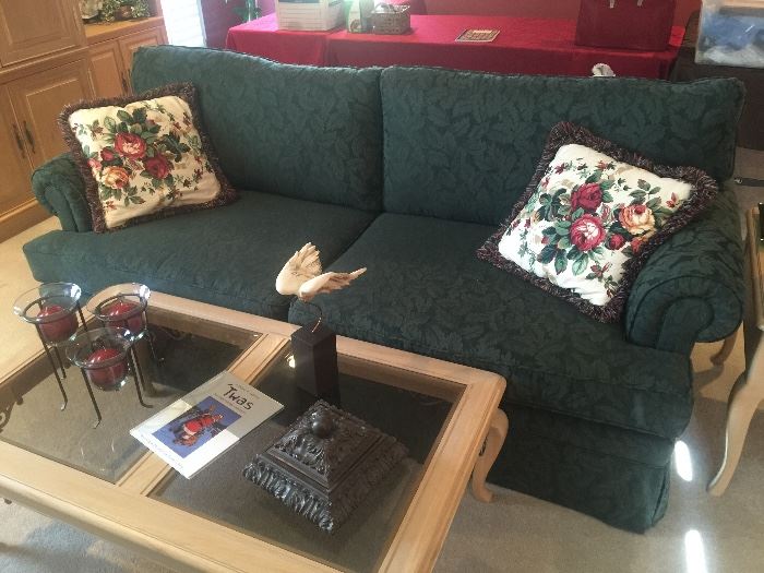 Green brocade sofa and Blonde wood coffee table