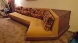This appears to be an Adrian Pearsall sofa it is in great condition and has a side cabinet.