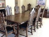 Table seating for 8 with 2 arm chairs and matching buffet server