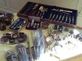 Sterling Silver: spoons, salt and pepper shakers, set of 1896 salt cellers, child's serving set, and more.