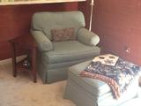 Upholstered chair and ottoman