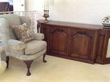 Entertainment center and upholstered chair, and lamps