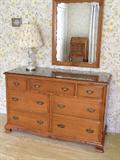 dresser with mirror and lamp