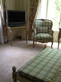 Designer upholstered chair, bench, side-table, flat-screen TV (furniture pieces have matching desk, chair, and armoires (2) with screens and shelves