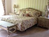 King headboard and matching nightstands. Mattress is a Sleep Number bed.
