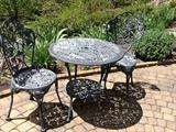 wrought iron patio table and chairs