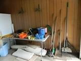 Carpet remnants, various outdoor tools, buckets, etc - in garage