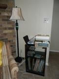 Small cabinet, records, cd's & dvd's; standing lamp