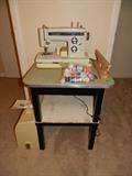 Sewing machine with case, table, miscellaneous sewing items