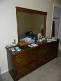 Vintage dresser-mirror with miscellaneous items