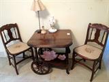 Antique Needlepoint chairs and early American Drop leaf cart in nursery