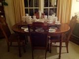 Cane and Hardwood Dining Set with leaf - topped with Milk Glass Collection