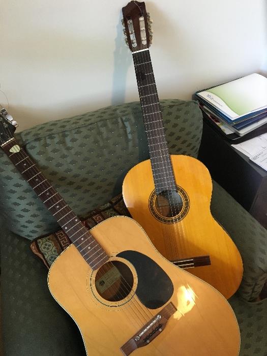 2 acoustic guitars