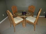 Nice Wicker table set with 4 chairs; glass top