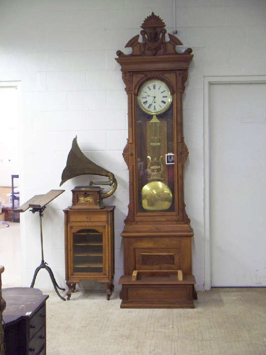 this grandfather clock can stand up to 12 ft tall with the two bases