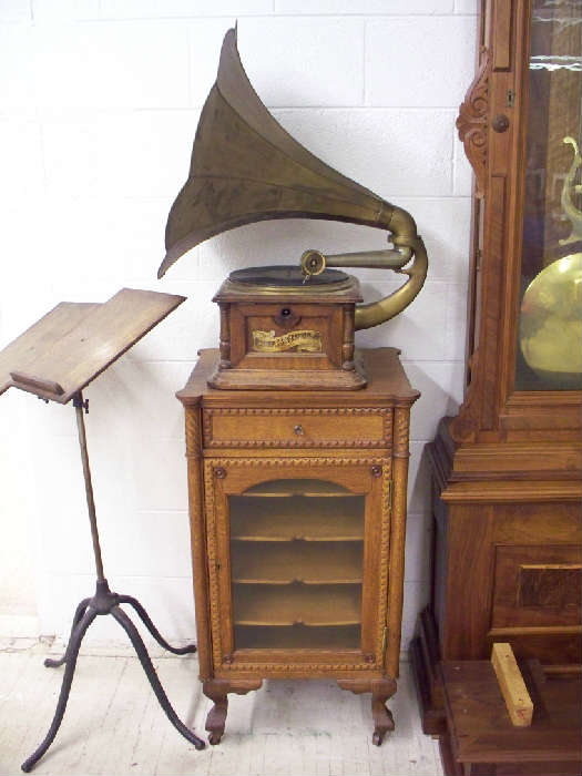 Victrola, antique stand, and antique bible stand