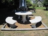 CONCRETE TABLE AND THREE BENCHES