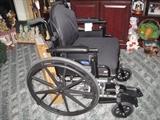 VERY NICE WHEELCHAIR WITH EXTRA CUSHIONS