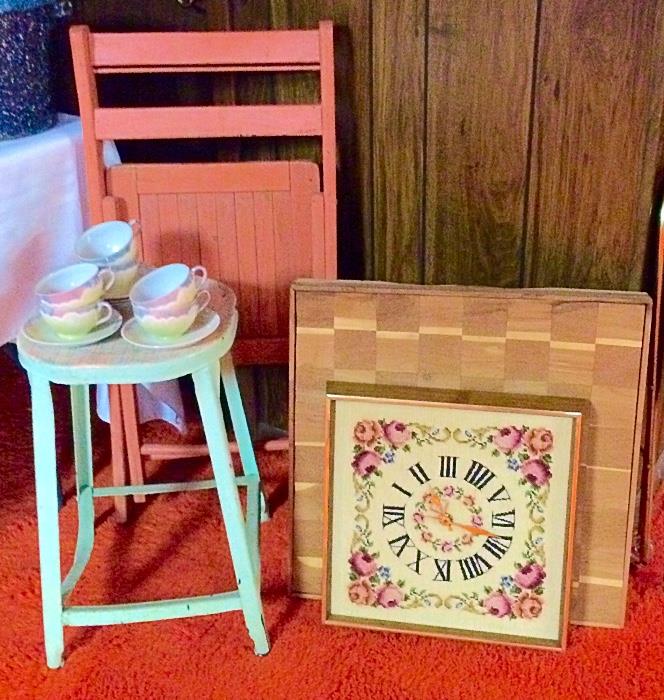 Vintage Wood Folding Chairs (Multiple, Painted & Unpainted), Painted Metal Stools, Vintage Eggshell Teacups, Vintage Needlepoint Wall Clock, Vintage Wood Serving Board